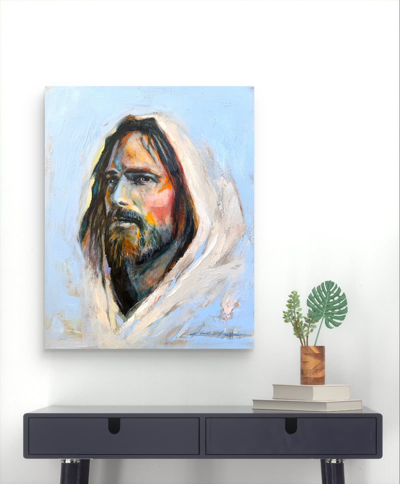 Christian Artwork hanging over a minimalist desk.