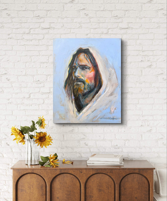 Oil Painting print of Jesus on a white brick wall above a wooden console table with sunflowers.

